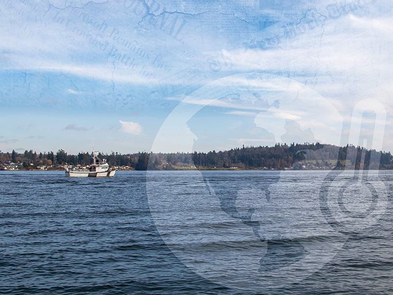 Tulalip Natural Resources Climate Change in the News scene of a boat on the water in Tulalip Bay