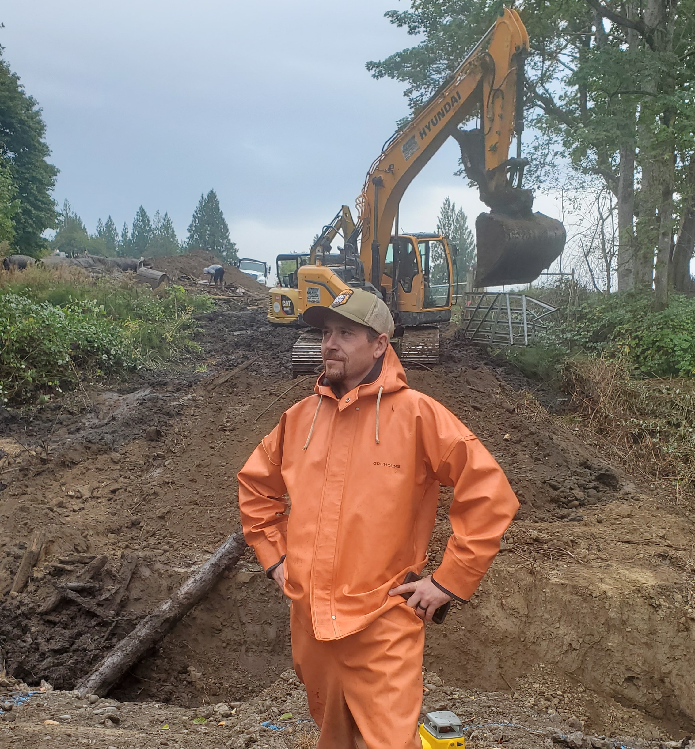 Restoration Acquisition And Stewardship Program - Person in front of construction 1