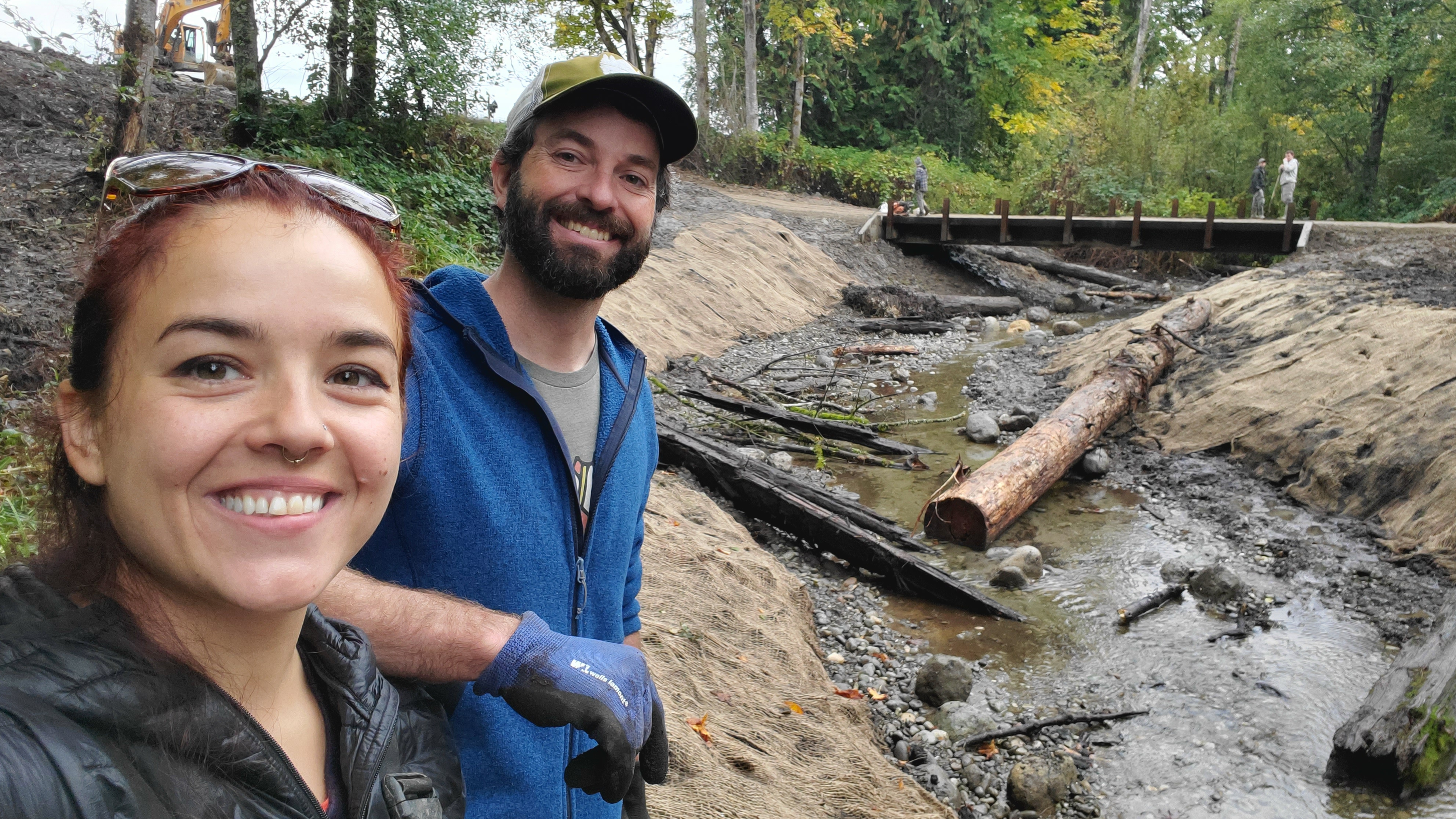 Restoration Acquisition And Stewardship Program - Two people in waterway