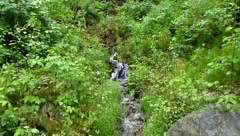Natural Resources video of a stream draining from the base of a landslide