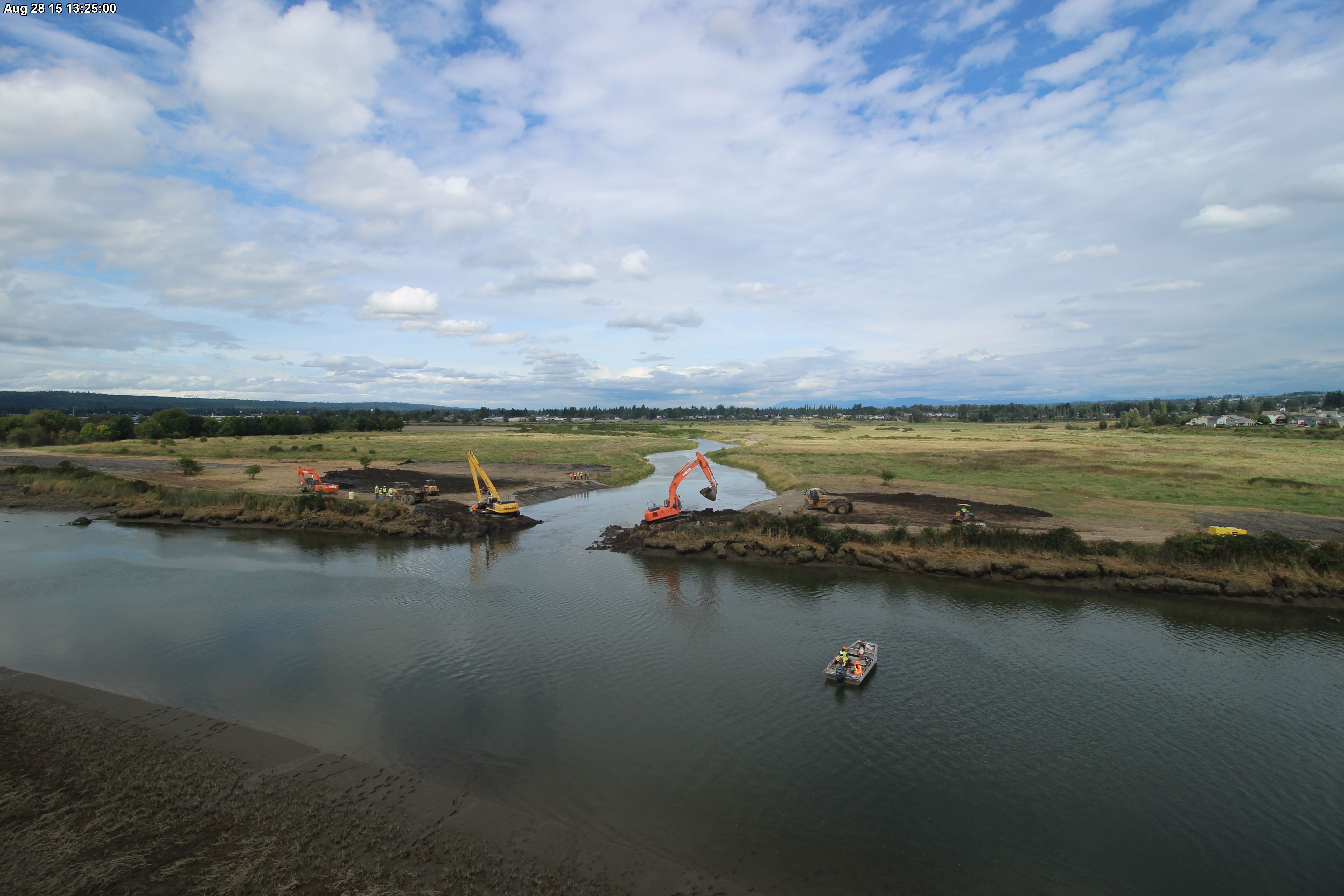 Restoration Acquisition And Stewardship Program - Construction on waterway - wide shot