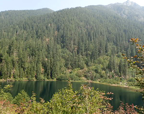 Natural Resources beautiful scene of foothills and lake along trail